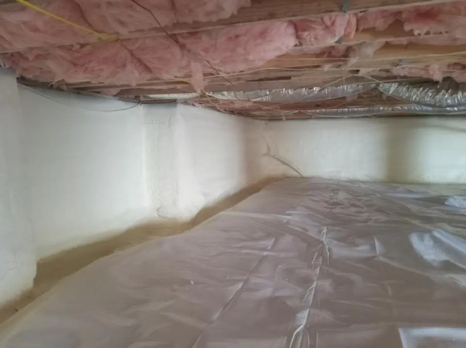 Crawl space encapsulation with closed-cell spray foam for Roof Waterproofing in Wellsville
